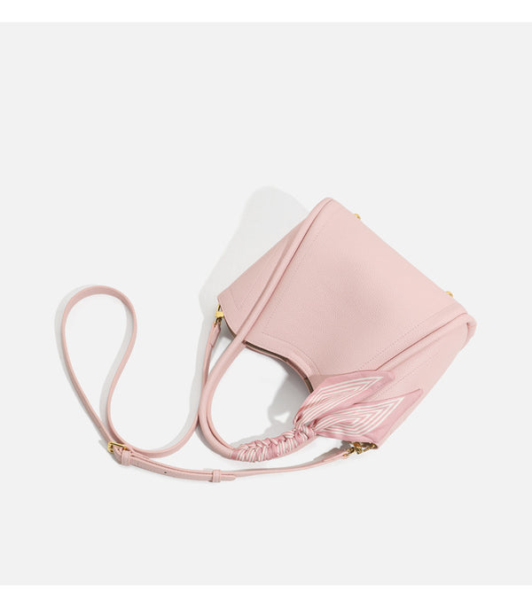 Pebbled leather-look bucket tote bag with scarf-wrapped top handle and gold-tone hardware, detail view 12