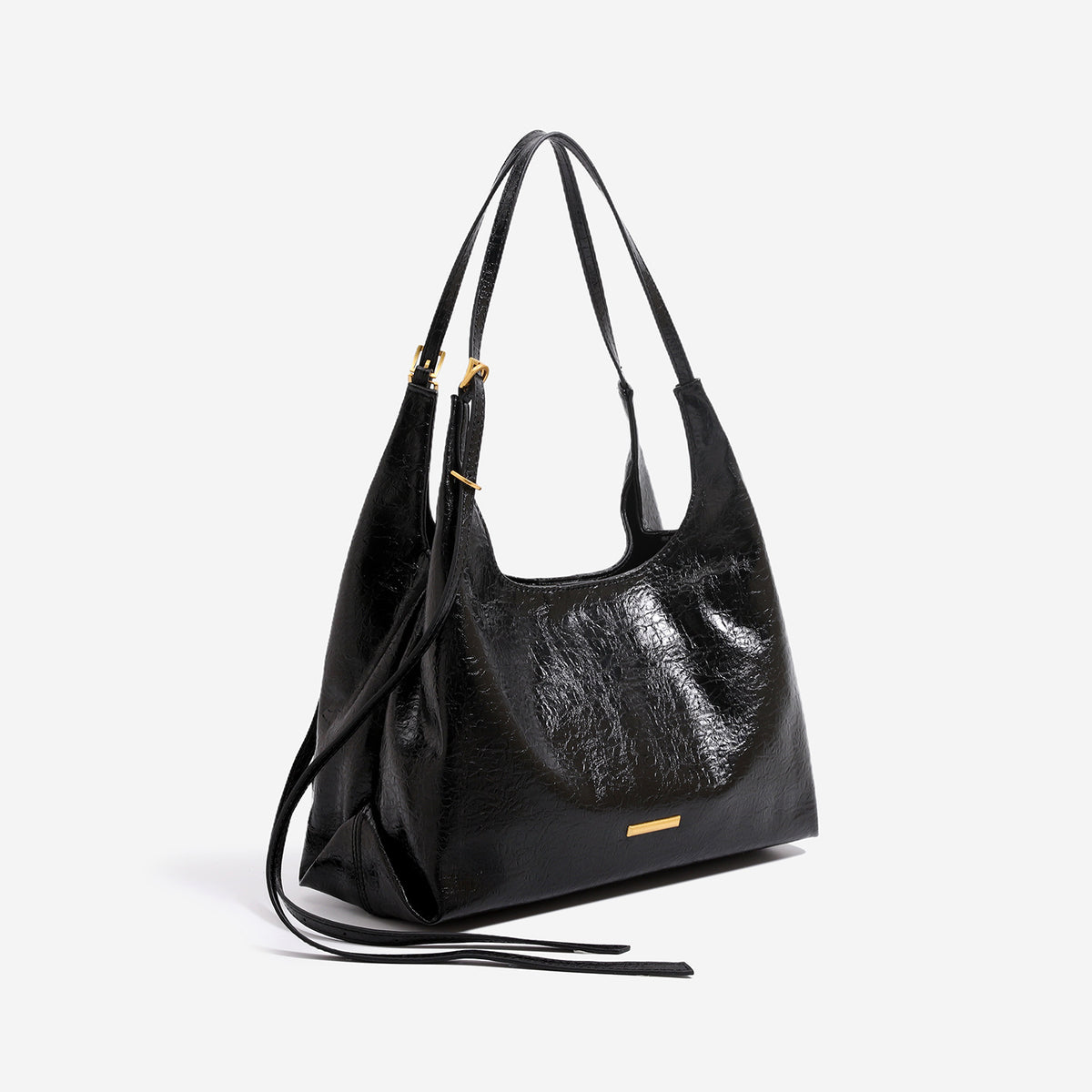 Slouchy hobo shoulder bag in crinkle high-gloss leather-look finish with gold-tone bar hardware and adjustable strap, detail