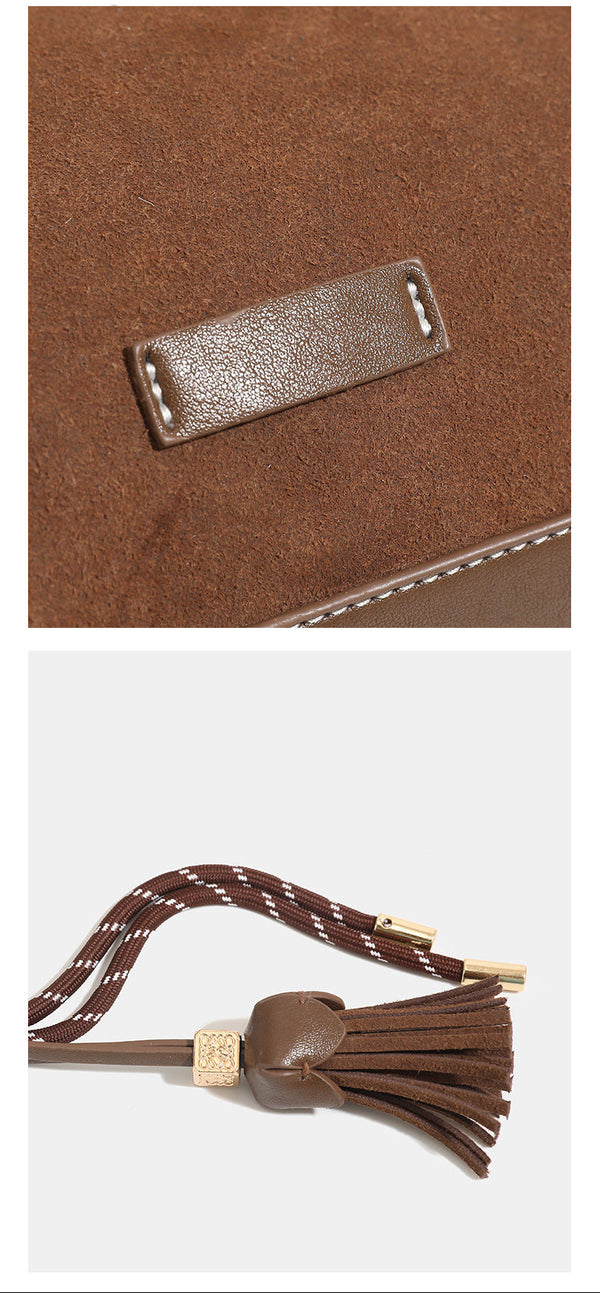 Slouchy suede-finish hobo shoulder bag in warm mocha brown with contrast stitching, braided tassel side accent, and, detail