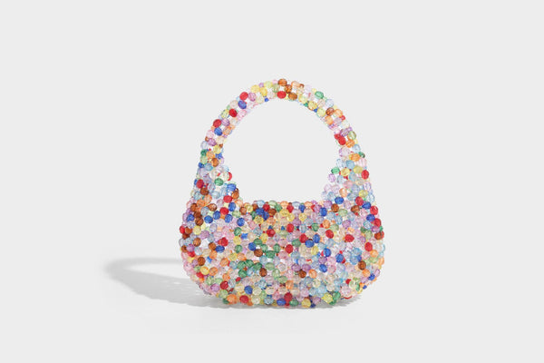 Kleine, abgerundete Hobo-Bag mit facettierten, durchscheinenden Perlen in Kristalloptik, passendem Perlenhenkel oben und silberfarbenen Details