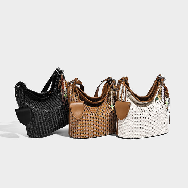 Slouchy open-weave hobo shoulder bag with leather-look trim, beaded tassel charm, and adjustable strap, detail view 2