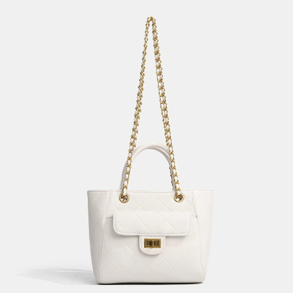 Diamond-quilted leather-look shoulder tote bag with gold-tone chain strap and dual top handles, detail view 5