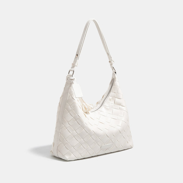Large woven checker hobo shoulder bag with slim strap, silver-tone hardware, and braided tassel zipper pull, detail view 3