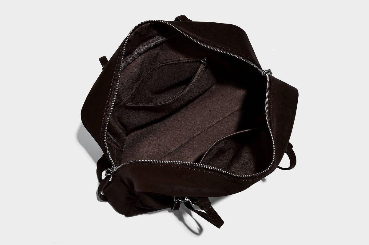 Structured rectangular matte suede-like shoulder bag with silver-tone hardware, zip closure, double top handles, and, detail