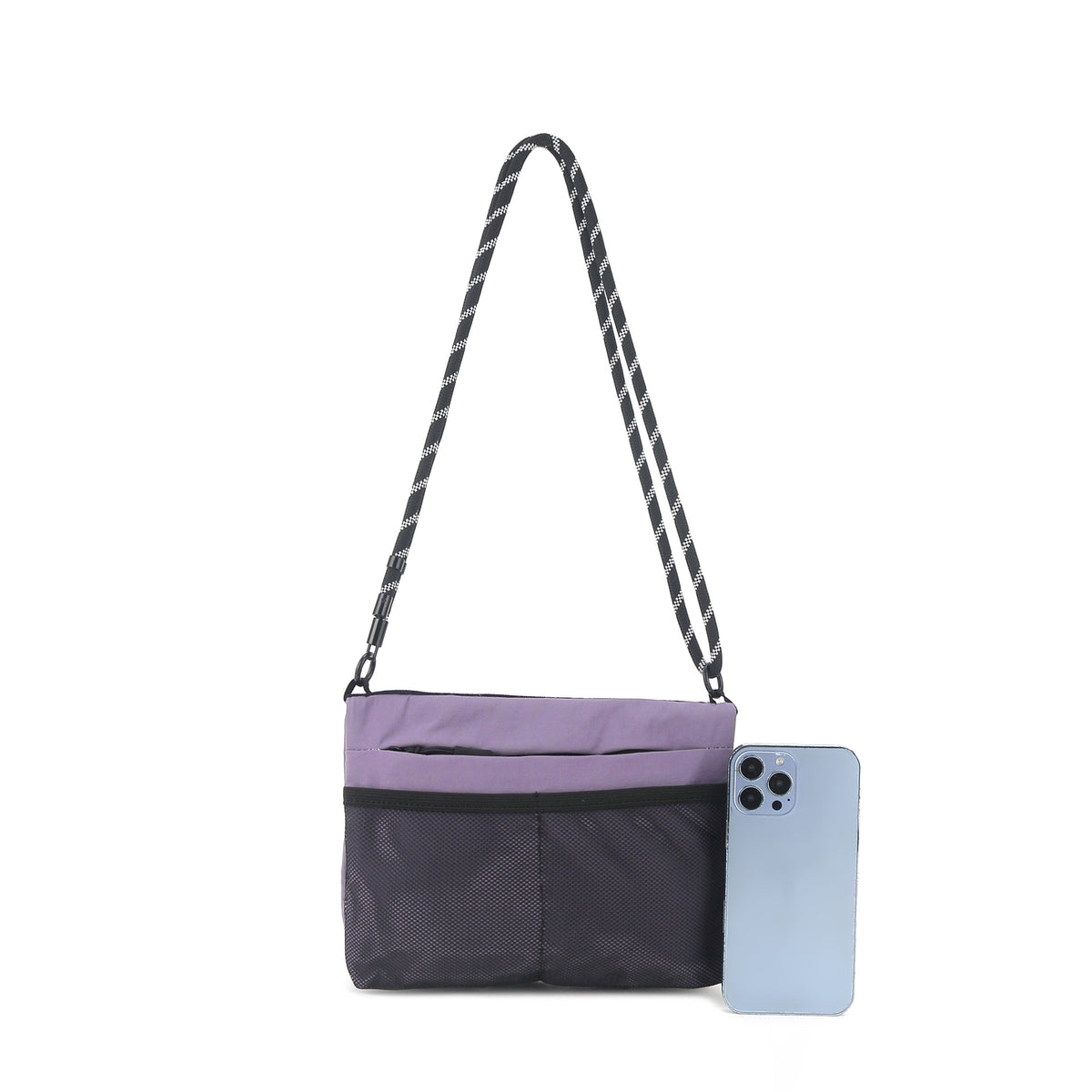 Flat rectangular crossbody bag with mesh front pocket, top zip closure, and adjustable patterned strap, detail view 16