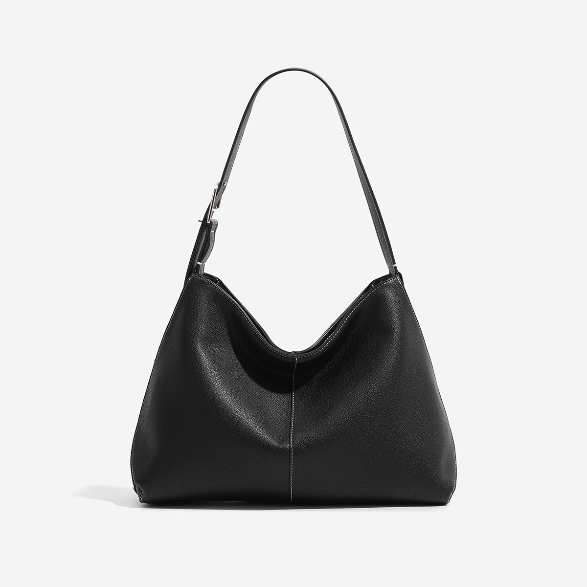 Soft pebbled leather-look hobo shoulder bag with crescent dipped opening, central seam, and adjustable strap, detail view 7