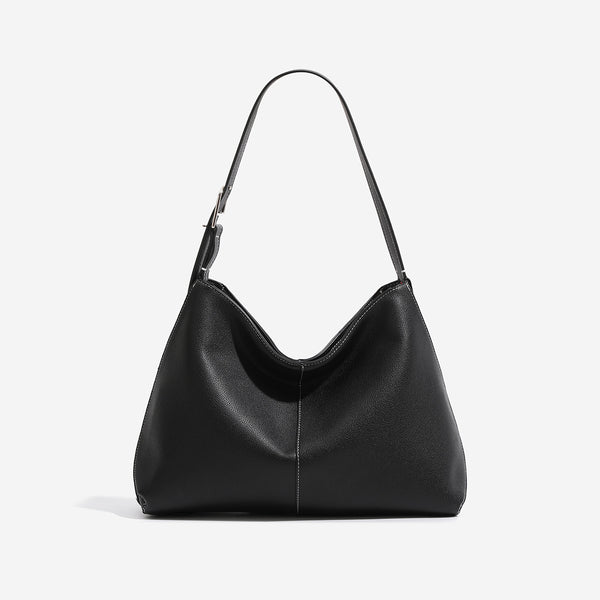 Soft pebbled leather-look hobo shoulder bag with crescent dipped opening, central seam, and adjustable strap, detail view 7