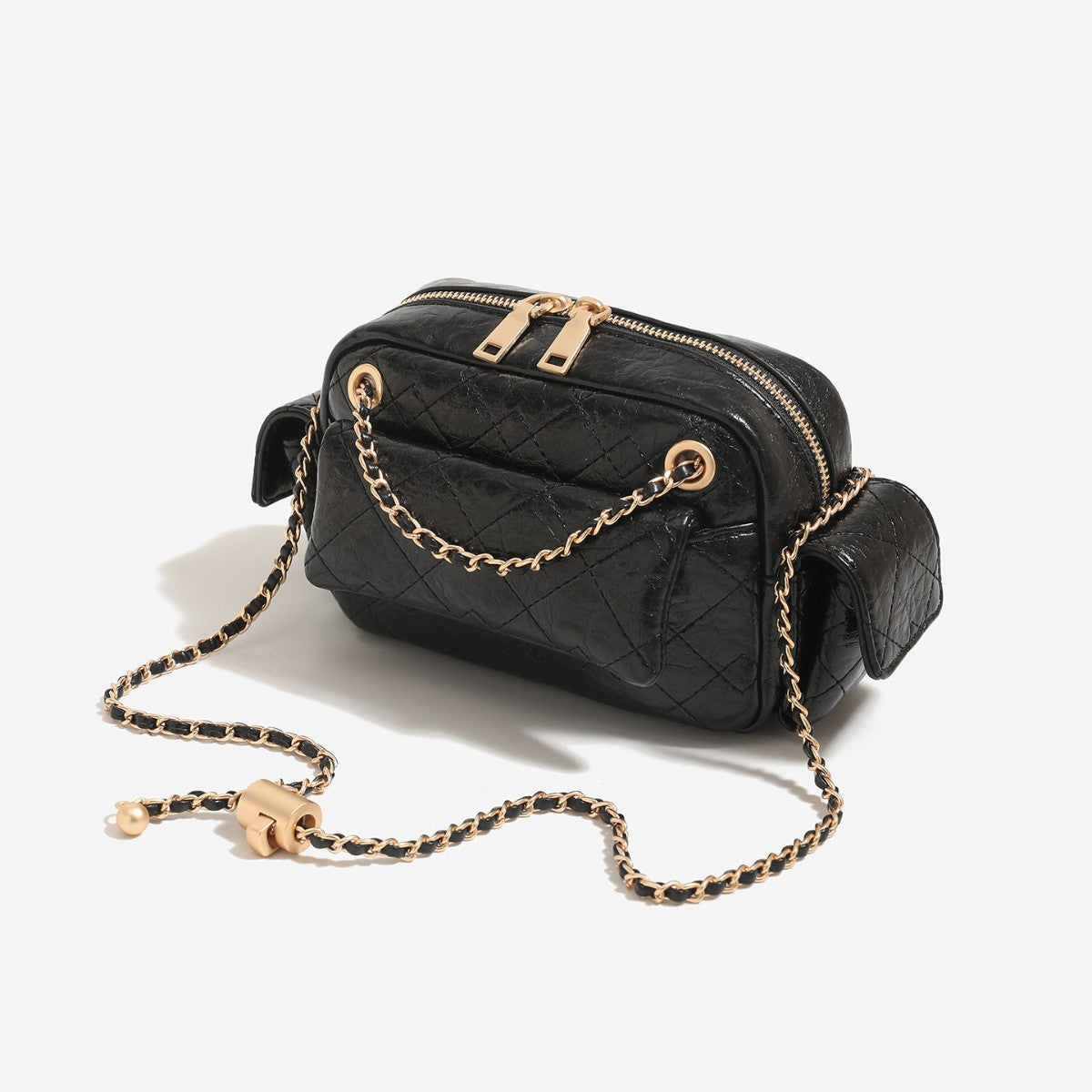 Compact quilted leather-look crossbody bag with gold-tone chain strap and double zip closure, detail view 3