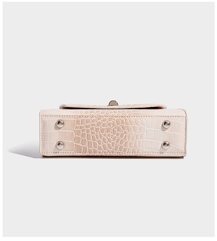 Small structured crocodile-embossed glossy top-handle satchel bag with silver-tone turn-lock clasp and detachable shoulder