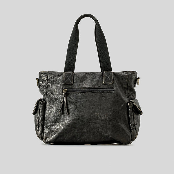 Slouchy crinkled pebbled leather-look convertible tote bag in gunmetal black with woven top handles, adjustable shoulder