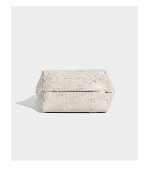 Quilted diamond-pattern tote bag with attached front zip pouch and long shoulder straps, detail view 11