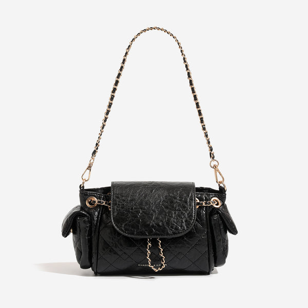 Small quilted diamond-pattern chain shoulder bag with flap closure and gold-tone hardware, detail view 3