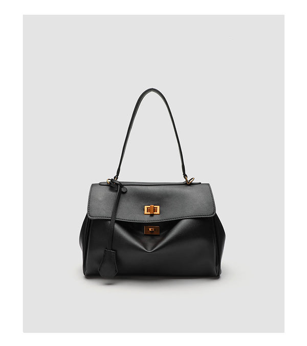 Structured black leather-look flap satchel bag with silver turn-lock hardware and top handle, detail view 23