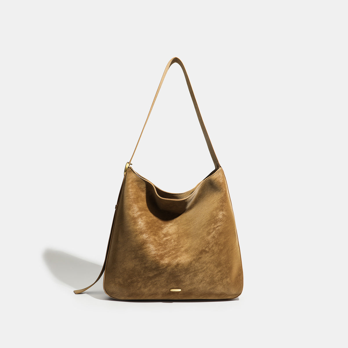 Large slouchy hobo tote bag in distressed dark brown leather-look finish with long shoulder strap, gold-tone ring hardware