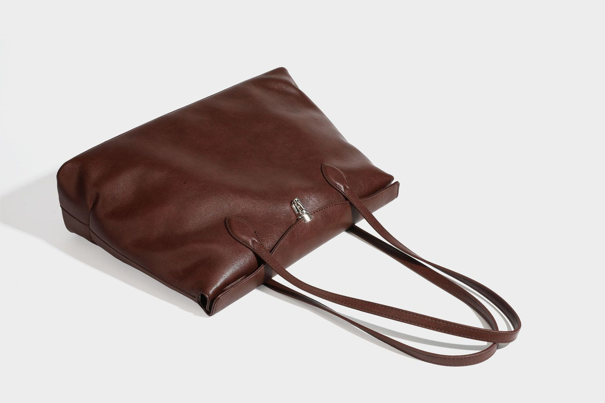 Large leather-look tote shoulder bag with slim double straps and silver-tone turn-lock closure, detail view 36