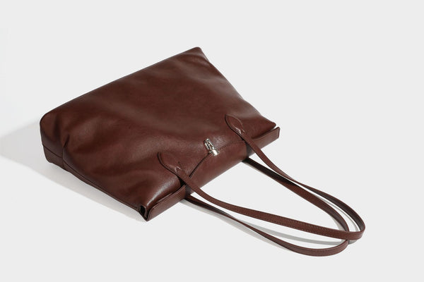 Large leather-look tote shoulder bag with slim double straps and silver-tone turn-lock closure, detail view 36