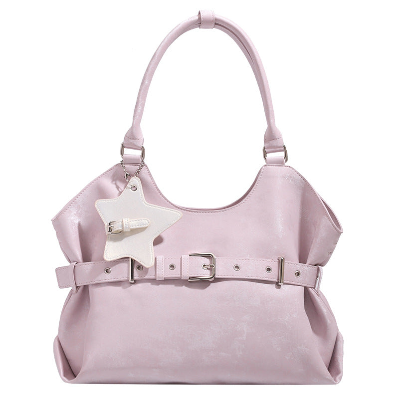Large soft hobo shoulder bag with glossy textured finish, decorative belt buckle, star charm, and silver-tone hardware