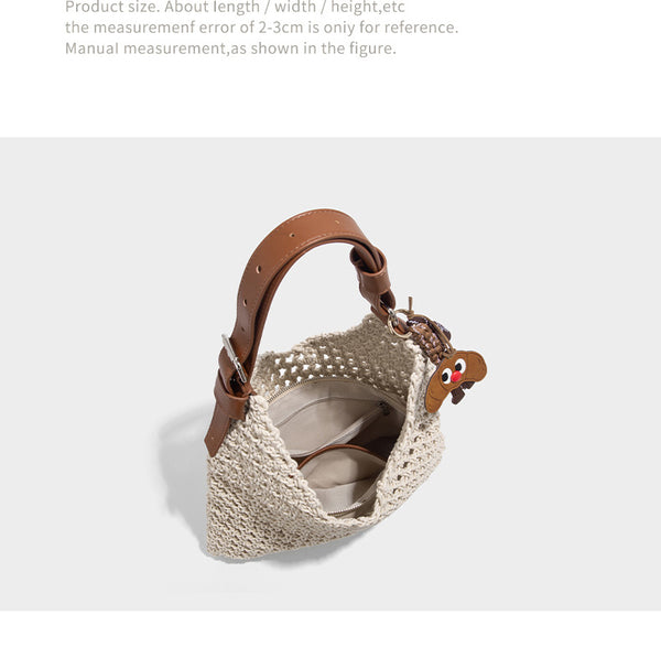 Slouchy open-knit crochet hobo tote bag with leather-look top handle and metal buckle hardware, detail view 9