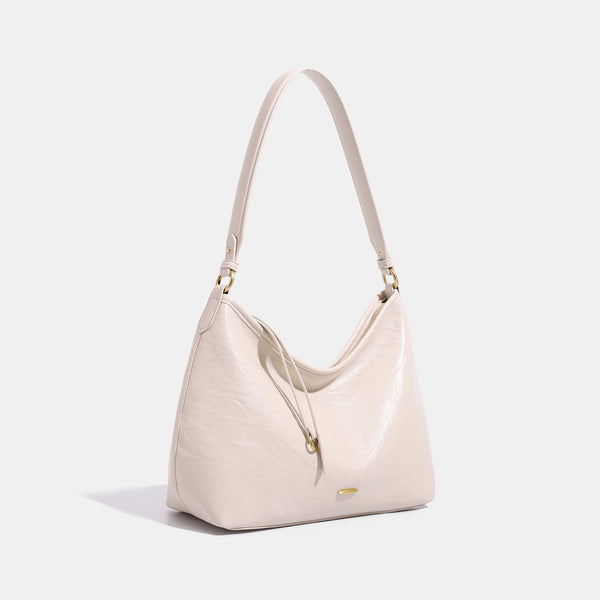 Large crinkled leather-look hobo shoulder bag with zip closure and gold-tone hardware, detail view 3
