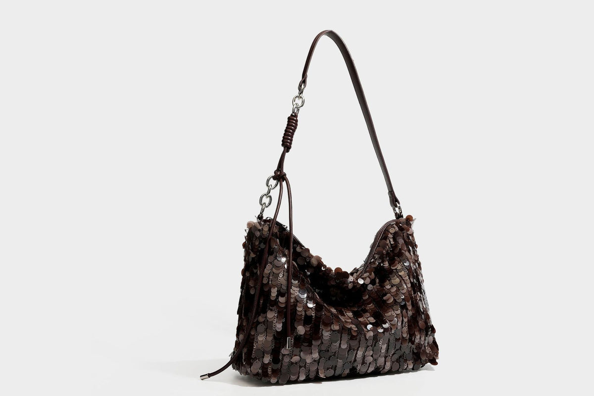 Slouchy paillette sequin hobo shoulder bag with zip closure and adjustable leather-look strap with silver chain hardware