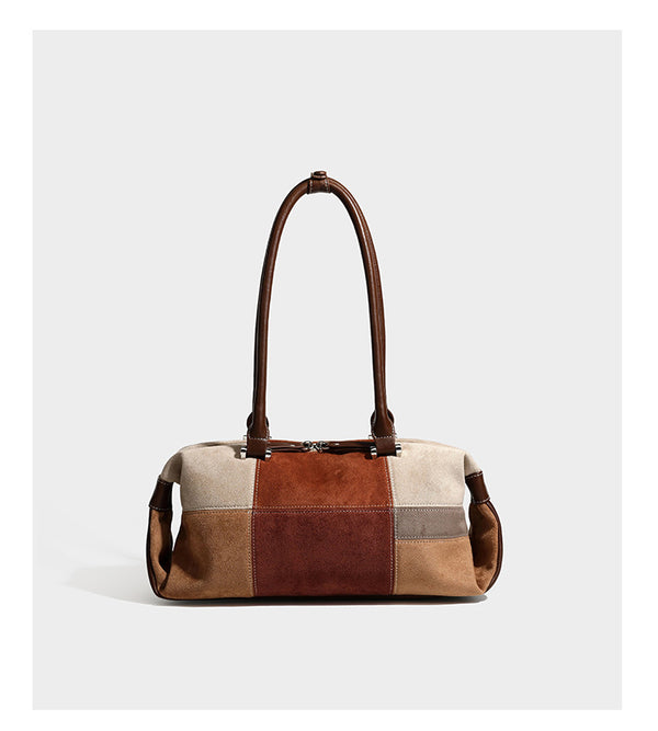 Patchwork suede-look barrel shoulder bag in brown, rust, tan, beige, and gray panels with double leather-look straps and