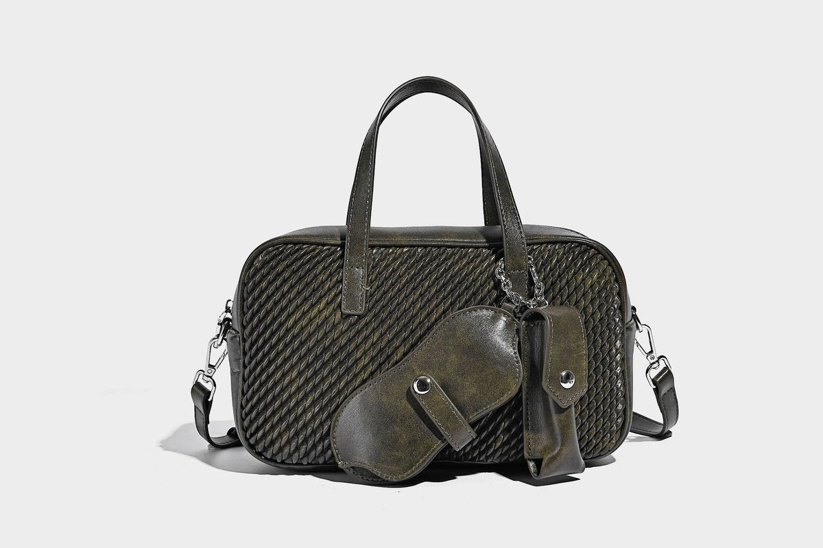 Structured woven-texture front top-handle handbag with zip closure, dual handles, detachable shoulder strap, and matching
