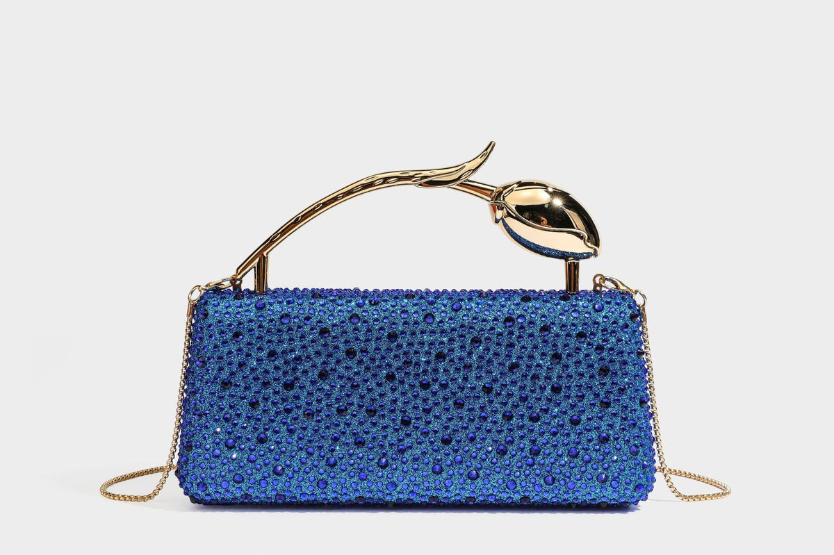 rectangular hard-case rhinestone evening clutch with sculptural gold-tone branch-and-bud top handle and detachable chain