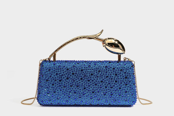 rectangular hard-case rhinestone evening clutch with sculptural gold-tone branch-and-bud top handle and detachable chain