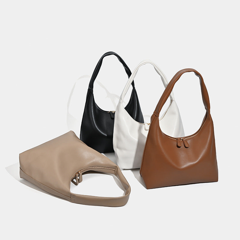 Smooth leather-look slouchy hobo shoulder bag with zip closure and wide single strap, detail view 2