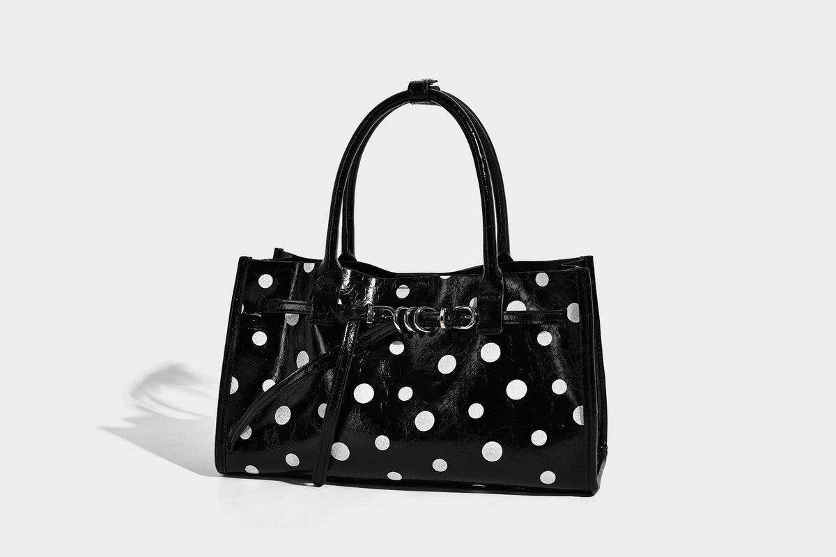 Structured glossy leather-look polka-dot satchel tote with dual top handles and detachable shoulder strap, detail view 12