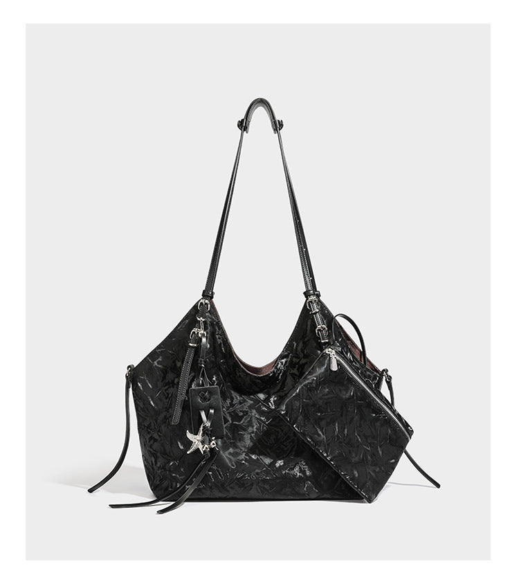 Slouchy crinkle-finish shoulder tote bag with silver hardware and attached zip pouch, detail view 14