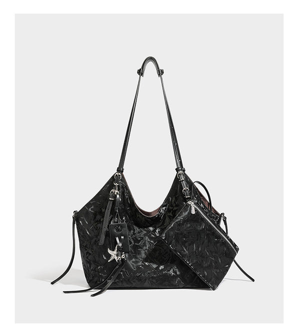Slouchy crinkle-finish shoulder tote bag with silver hardware and attached zip pouch, detail view 14
