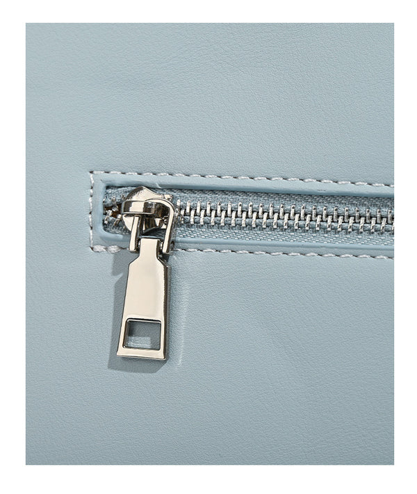 Powder blue structured tote bag with dual front flap buckle pockets and silver-tone hardware, detail view 14