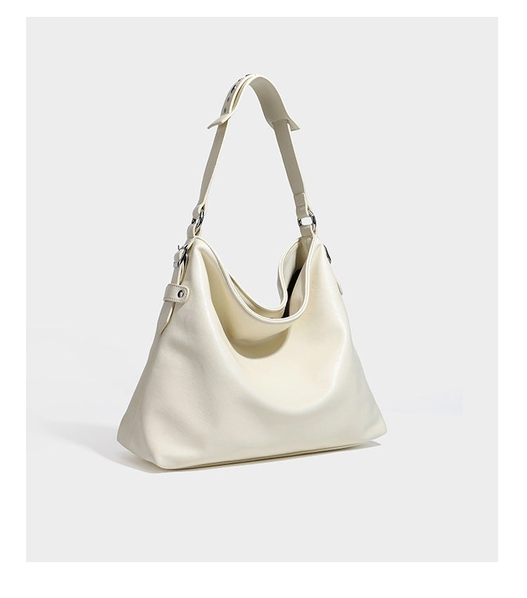 Large slouchy hobo shoulder bag in dark brown with smooth leather-look finish, adjustable strap, and silver-tone hardware
