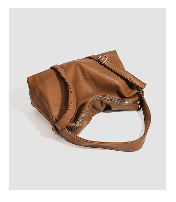 Slouchy leather-look hobo shoulder bag with top zipper and silver-tone hardware, detail view 22