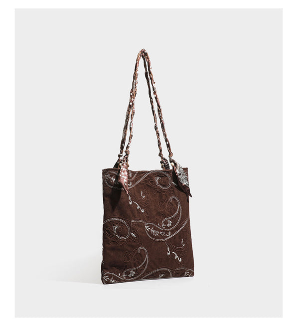 Brown suede-finish tote bag with paisley embroidery and braided fabric-ribbon shoulder strap, detail view 14