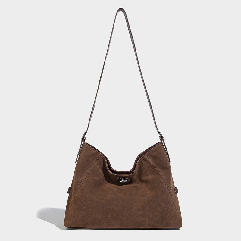 Slouchy hobo shoulder bag with turn-lock flap closure and adjustable strap, detail view 26