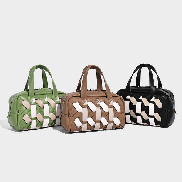 Small structured satchel bag with two-tone woven front panel, dual top handles, and detachable crossbody strap in tan brown