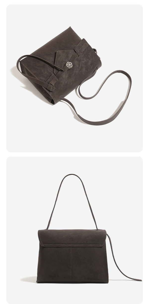 Strukturierte rechteckige Klappentasche mit floralem Metalldrehverschluss und verstellbarem Crossbody-Riemen aus matt strukturiertem