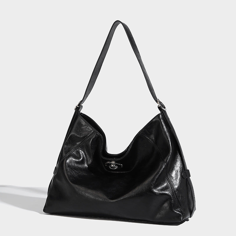 Slouchy hobo shoulder bag with turn-lock flap closure and adjustable strap, detail view 29