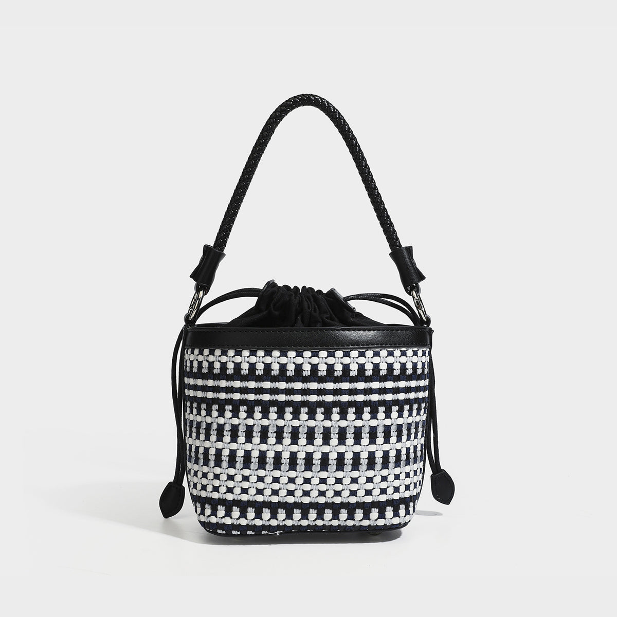 Small structured woven checker bucket bag with braided top handle, drawstring closure, and silver-tone hardware in black