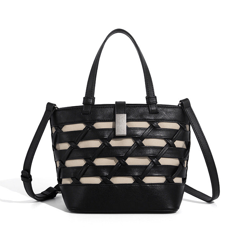 Structured woven lattice tote bag with cream lining, dual top handles, detachable crossbody strap, and silver-tone hardware
