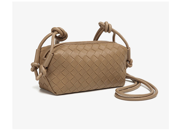Small rectangular woven-texture mini crossbody bag with knotted rope strap and gold-tone zip closure, detail view 21