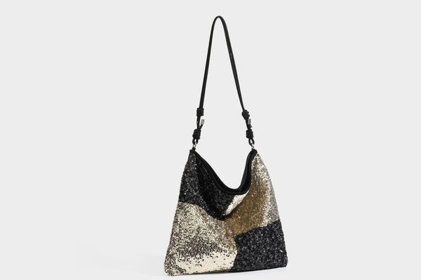Lässig-weicher Patchwork-Schultershopper mit Pailletten, schwarz-goldenen oder creme-silbernen Colorblocking-Einsätzen und verstellbarem, schmalem Riemen