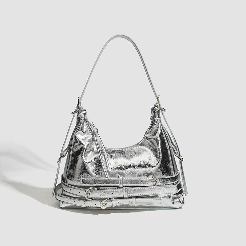 Slouchy hobo shoulder bag in glossy crinkled leather-look finish with silver-tone buckle hardware and slim adjustable strap