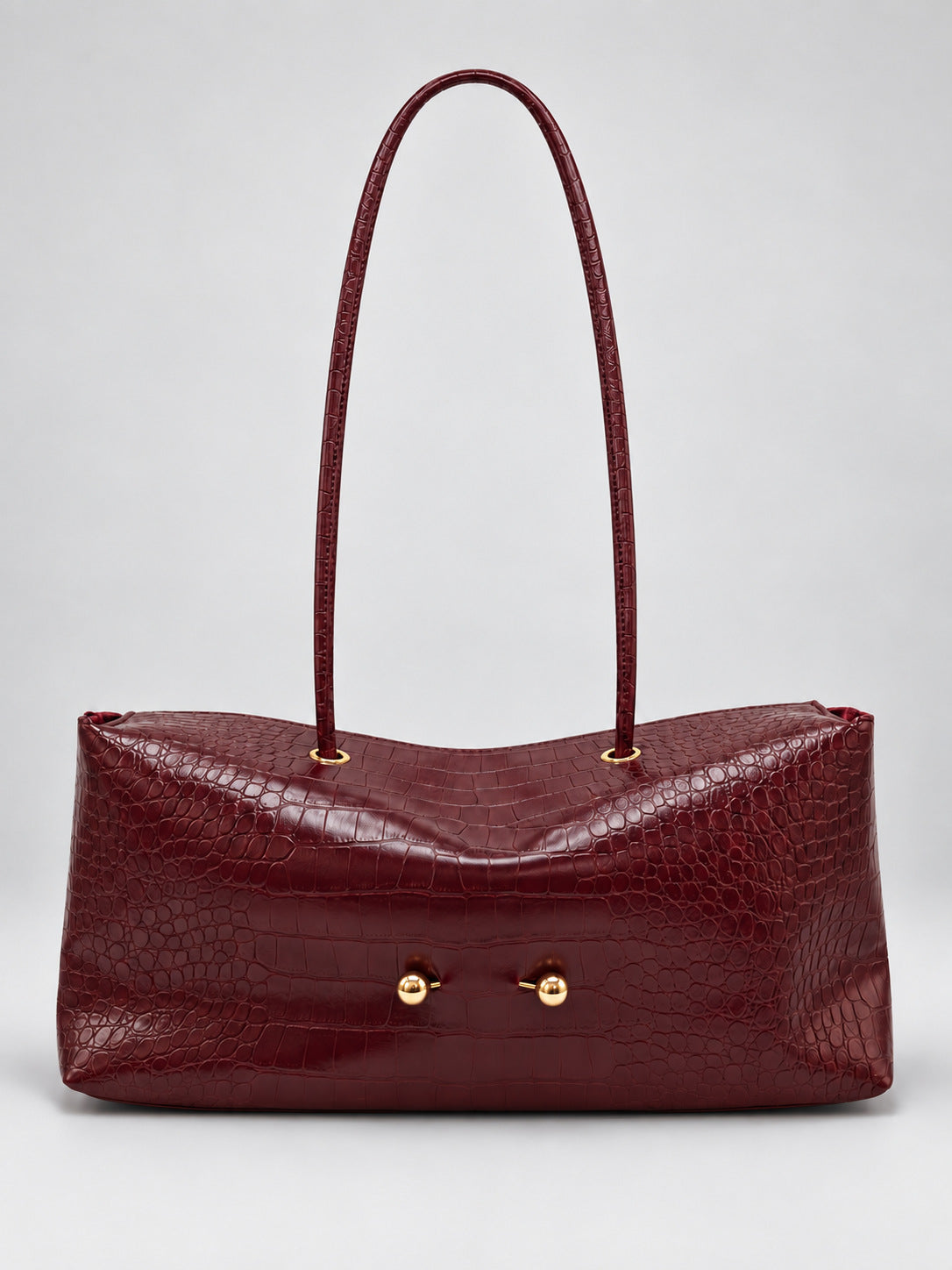Wide embossed-texture shoulder tote bag with single loop handle and gold-tone toggle hardware, detail view 9