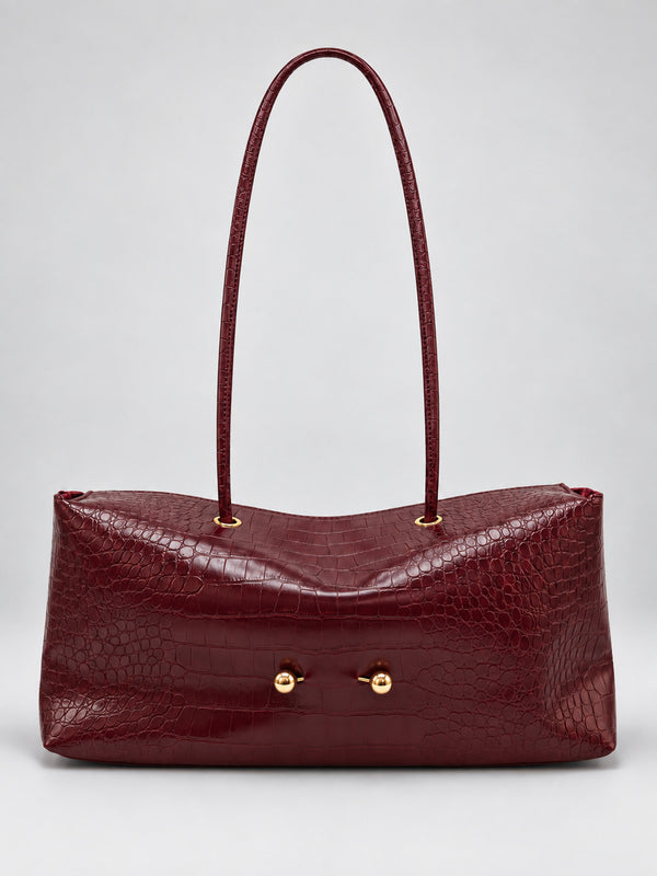Wide embossed-texture shoulder tote bag with single loop handle and gold-tone toggle hardware, detail view 9