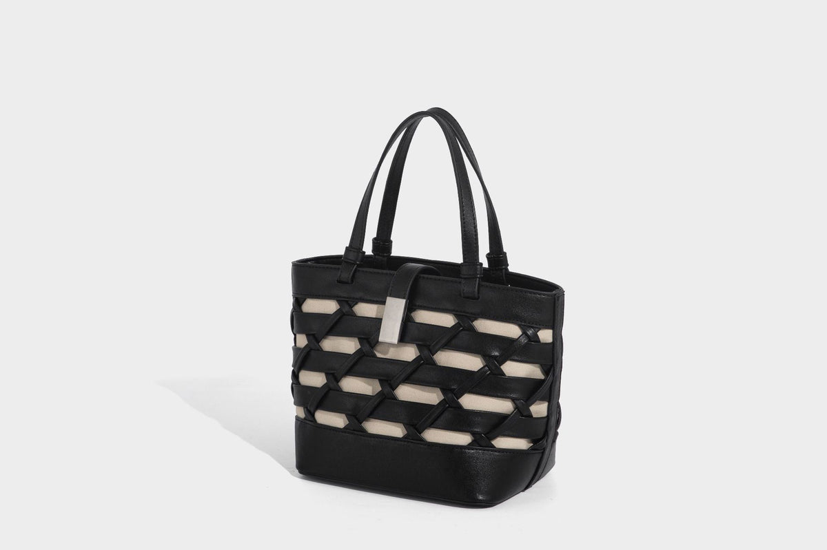 Structured woven lattice tote bag with cream lining, dual top handles, detachable crossbody strap, and silver-tone hardware