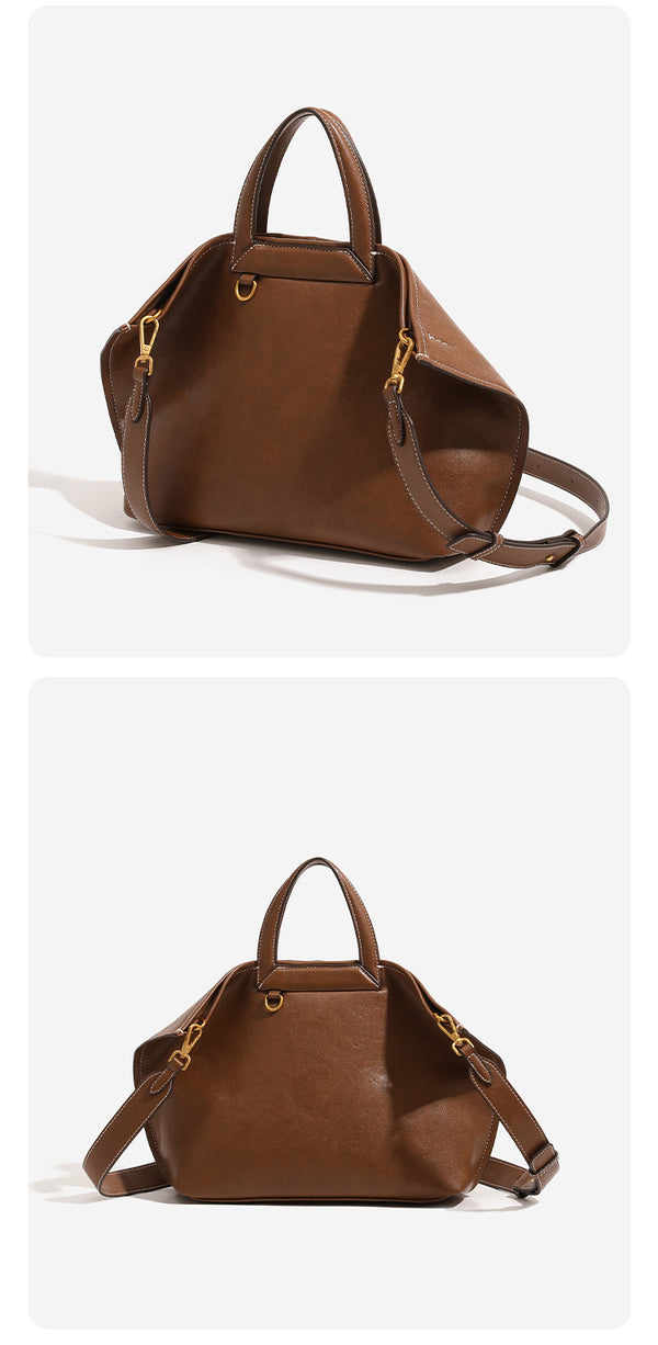 Structured cognac brown leather-look tote bag with fold-ear side panels, top handles, gold-tone hardware, and detachable