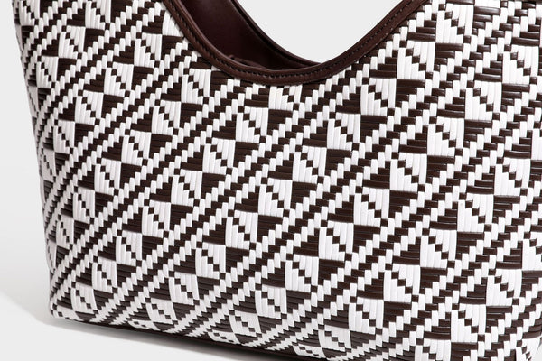 Woven geometric two-tone tote bag with braided shoulder straps and leather-look trim, detail view 42